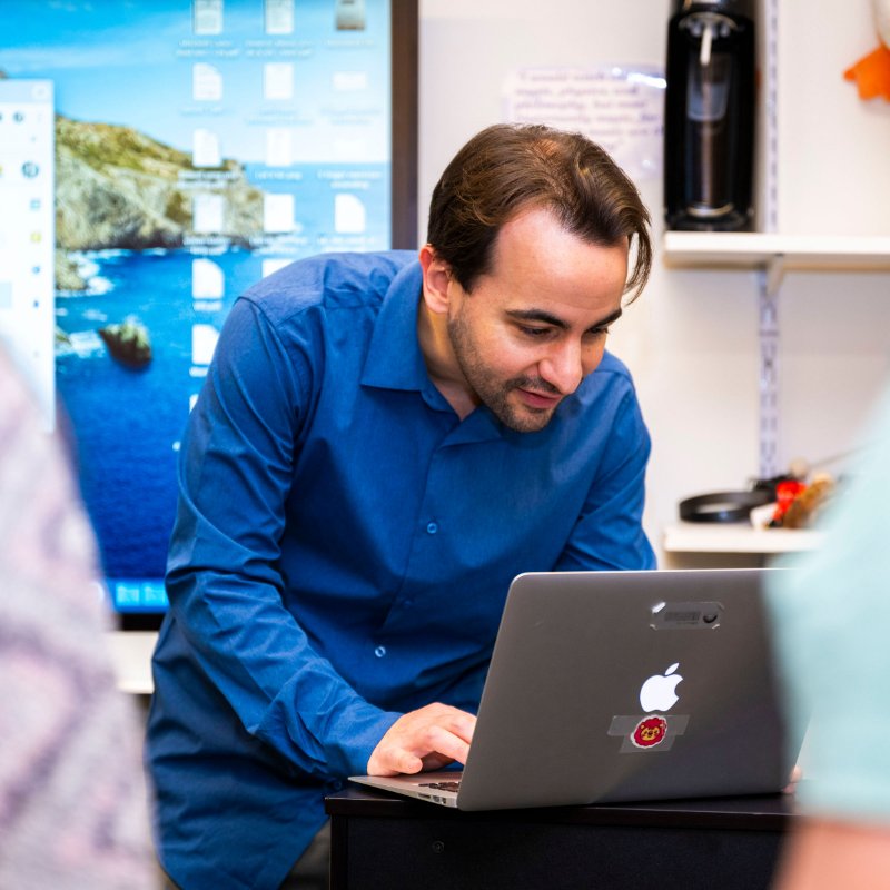Teacher on a laptop at Churchill School.